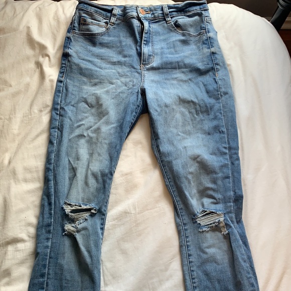 Mid/high rise light wash skinny jeans with small rips - Picture 3 of 4